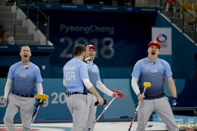 United States's Tyler George, John Landsteiner, skip John Shuster and Matt Hamilton, from left to right, celebrate winning a men's semi-final curling match against Canada at the 2018 Winter Olympics in Gangneung, South Korea, Thursday, Feb. 22, 2018. (AP Photo/Natacha Pisarenko)