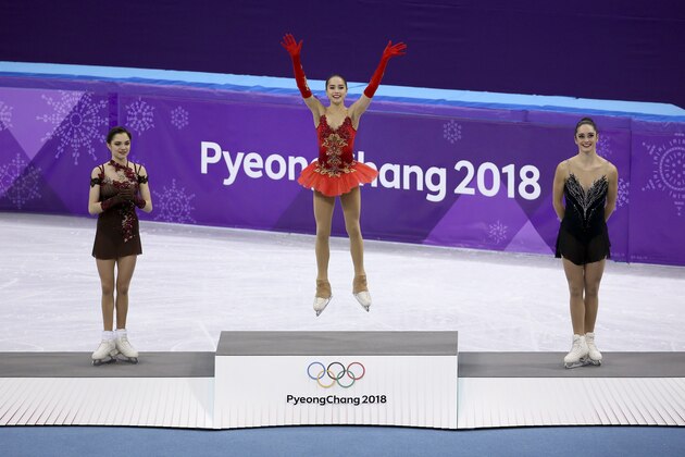GANGNEUNG, SOUTH KOREA - FEBRUARY 23: Silver medalist Evgenia Medvedeva of Olympic Athlete from Russia, gold medalist Alina Zagitova of Olympic Athlete from Russia, bronze medalist Kaetlyn Osmond of Canada during the venue victory ceremony following the Figure Skating Ladies Free program on day fourteen of the PyeongChang 2018 Winter Olympic Games at Gangneung Ice Arena on February 23, 2018 in Gangneung, South Korea. (Photo by Jean Catuffe/Getty Images)