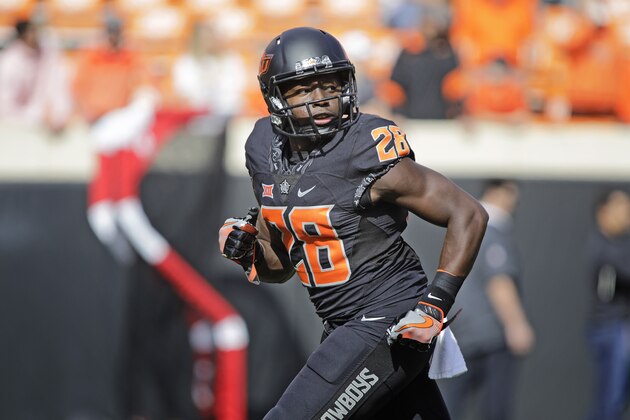 STILLWATER, OK - NOVEMBER 04: Wide receiver James Washington #28 of the Oklahoma State Cowboys warms up before the game against the Oklahoma Sooners at Boone Pickens Stadium on November 4, 2017 in Stillwater, Oklahoma. Oklahoma defeated Oklahoma State 62-52.  (Photo by Brett Deering/Getty Images)