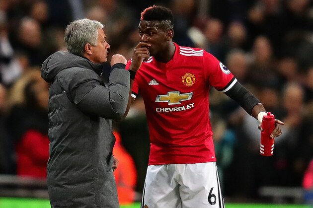 LONDON, ENGLAND - JANUARY 31:  Paul Pogba of Manchester United talks with Jose Mourinho, Manager of Manchester United on the sidelines during the Premier League match between Tottenham Hotspur and Manchester United at Wembley Stadium on January 31, 2018 in London, England.  (Photo by Chris Brunskill Ltd/Getty Images)