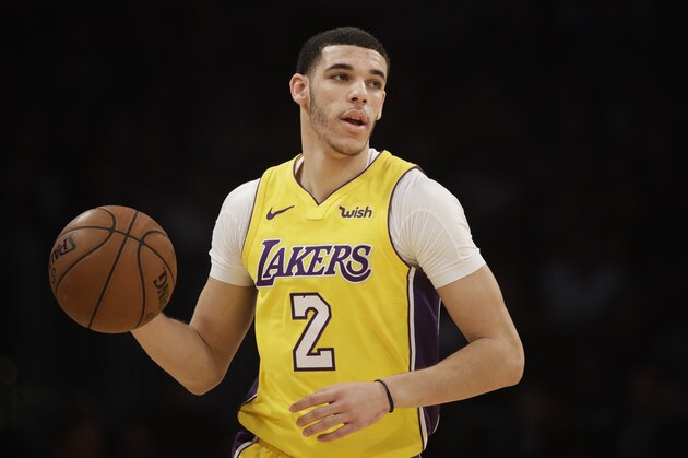 Los Angeles Lakers' Lonzo Ball dribbles the ball during the first half of an NBA basketball game against the San Antonio Spurs Thursday, Jan. 11, 2018, in Los Angeles. (AP Photo/Jae C. Hong)