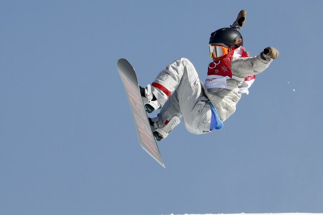 Jamie Anderson, of the United States, jumps during the women's Big Air snowboard final at the 2018 Winter Olympics in Pyeongchang, South Korea, Thursday, Feb. 22, 2018. (AP Photo/Matthias Schrader)