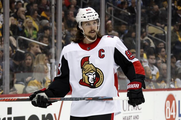 Ottawa Senators defenseman Erik Karlsson prepares for a face-off during an NHL hockey game against the Pittsburgh Penguins in Pittsburgh, Tuesday, Feb. 13, 2018. (AP Photo/Gene J. Puskar)