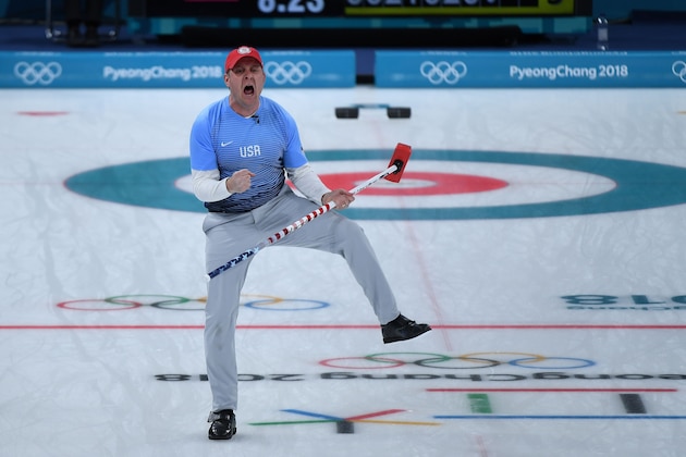 TOPSHOT - USA's John Shuster celebrates a point during the curling men's gold medal game between the USA and Sweden during the Pyeongchang 2018 Winter Olympic Games at the Gangneung Curling Centre in Gangneung on February 24, 2018. / AFP PHOTO / WANG Zhao        (Photo credit should read WANG ZHAO/AFP/Getty Images)