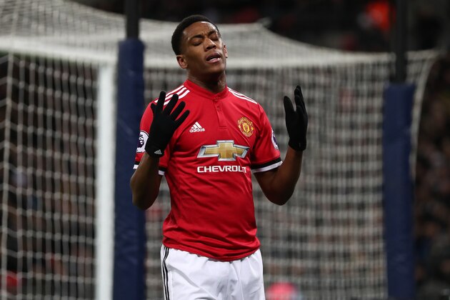 LONDON, ENGLAND - JANUARY 31: Anthony Martial of Manchester United reacts after missing a chance during the Premier League match between Tottenham Hotspur and Manchester United at Wembley Stadium on January 31, 2018 in London, England. (Photo by Catherine Ivill/Getty Images)