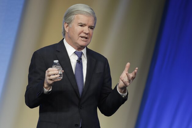 NCAA President Mark Emmert speaks during the NCAA Convention, Thursday, Jan. 18, 2018, in Indianapolis.  Emmert says the governing must act on a set of recommendations to clean up college basketball before the start of next season. He expects to receive the report from an independent commission by April 25. The Board of Governors will then be expected to vote on formal proposals at their August meeting. (AP Photo/Darron Cummings)