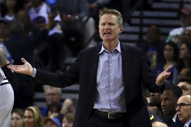 Golden State Warriors coach Steve Kerr gestures on the sideline during the first half of an NBA basketball game against the San Antonio Spurs, Saturday, Feb. 10, 2018, in Oakland, Calif. (AP Photo/Ben Margot)