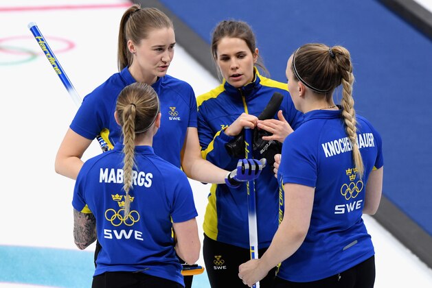 GANGNEUNG, SOUTH KOREA - FEBRUARY 25: Sofia Mabergs, Agnes Kochenhauer, Sara McManus of Sweden and Anna Hasselborg of Sweden in conversation during the Women's Gold Medal Game between Sweden and Korea on day sixteen of the PyeongChang 2018 Winter Olympic Games at Gangneung Curling Centre on February 25, 2018 in Gangneung, South Korea.  (Photo by Harry How/Getty Images)