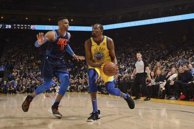 OAKLAND, CA - FEBRUARY 24: Kevin Durant #35 of the Golden State Warriors handles the ball against the Oklahoma City Thunder on February 24, 2018 at ORACLE Arena in Oakland, California. NOTE TO USER: User expressly acknowledges and agrees that, by downloading and or using this photograph, user is consenting to the terms and conditions of Getty Images License Agreement. Mandatory Copyright Notice: Copyright 2018 NBAE (Photo by Noah Graham/NBAE via Getty Images)