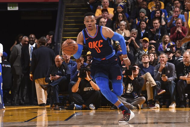 OAKLAND, CA - FEBRUARY 24: Russell Westbrook #0 of the Oklahoma City Thunder handles the ball against the Golden State Warriors on February 24, 2018 at ORACLE Arena in Oakland, California. NOTE TO USER: User expressly acknowledges and agrees that, by downloading and or using this photograph, user is consenting to the terms and conditions of Getty Images License Agreement. Mandatory Copyright Notice: Copyright 2018 NBAE (Photo by Noah Graham/NBAE via Getty Images)
