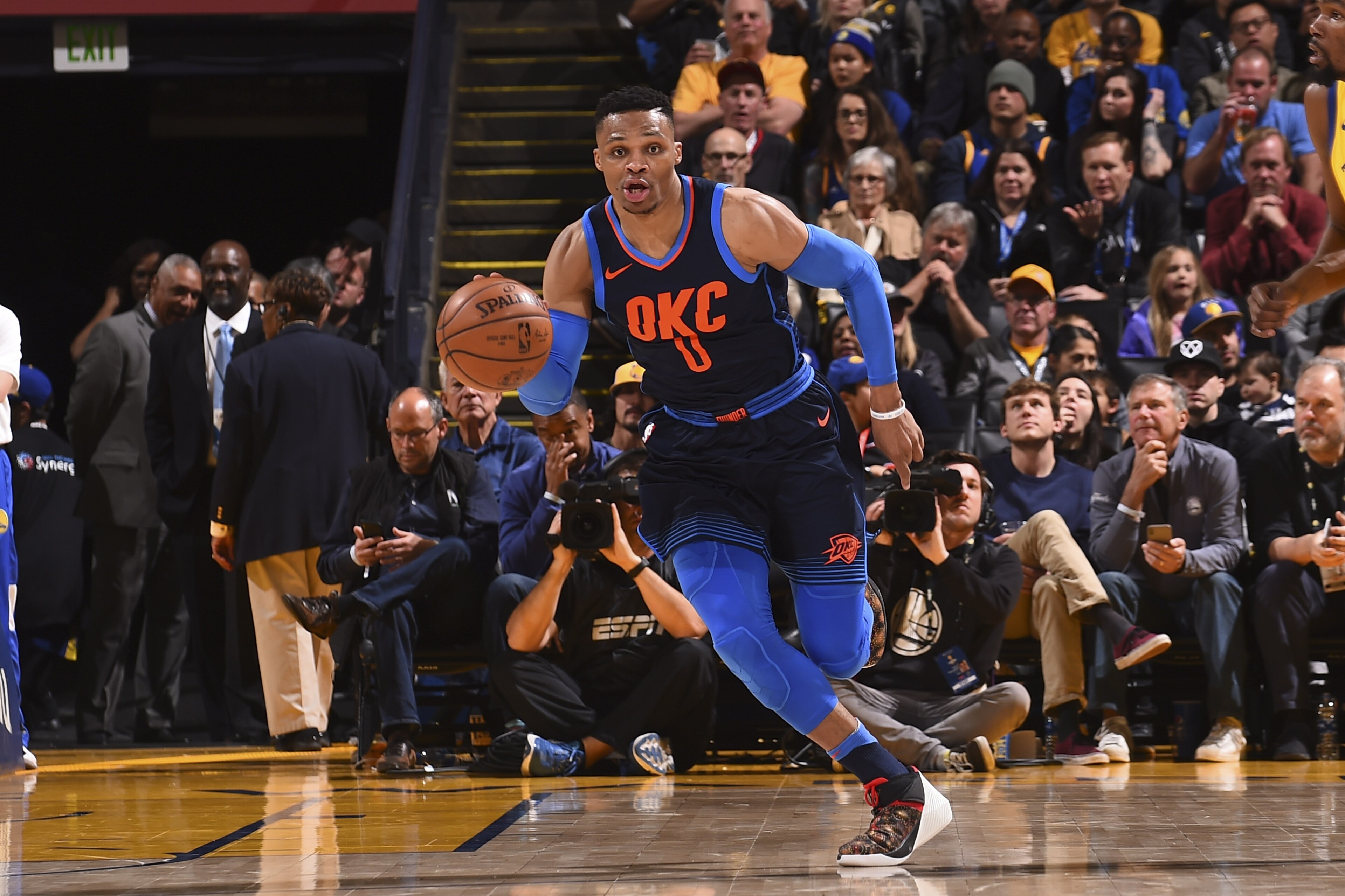OAKLAND, CA - FEBRUARY 24: Russell Westbrook #0 of the Oklahoma City Thunder handles the ball against the Golden State Warriors on February 24, 2018 at ORACLE Arena in Oakland, California. NOTE TO USER: User expressly acknowledges and agrees that, by downloading and or using this photograph, user is consenting to the terms and conditions of Getty Images License Agreement. Mandatory Copyright Notice: Copyright 2018 NBAE (Photo by Noah Graham/NBAE via Getty Images)