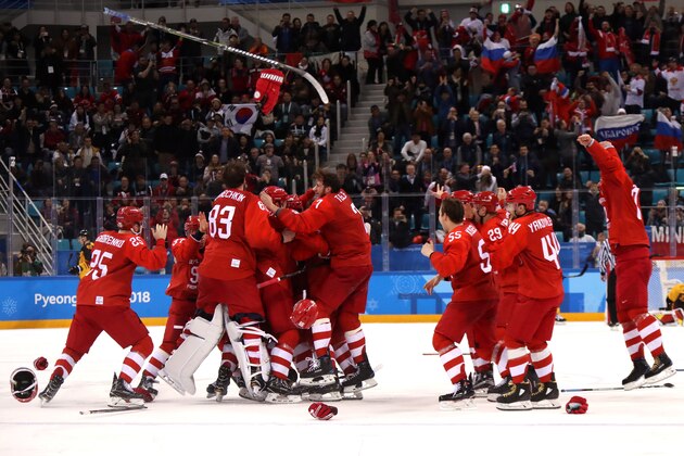 GANGNEUNG, SOUTH KOREA - FEBRUARY 25:  Gold medal winners Olympic Athletes from Russia celebrate after defeating Germany 4-3 in overtime during the Men's Gold Medal Game on day sixteen of the PyeongChang 2018 Winter Olympic Games at Gangneung Hockey Centre on February 25, 2018 in Gangneung, South Korea.  (Photo by Bruce Bennett/Getty Images)