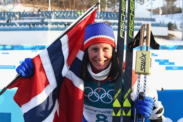 PYEONGCHANG-GUN, SOUTH KOREA - FEBRUARY 25:  Marit Bjoergen of Norway celebrates winning the Ladies' 30km Mass Start Classic on day sixteen of the PyeongChang 2018 Winter Olympic Games at Alpensia Cross-Country Centre on February 25, 2018 in Pyeongchang-gun, South Korea.  (Photo by Quinn Rooney/Getty Images)