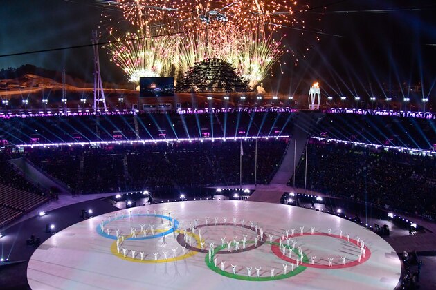 Fireworks light up the night sky as dancers perform during the closing ceremony of the Pyeongchang 2018 Winter Olympic Games at the Pyeongchang Stadium on February 25, 2018. / AFP PHOTO / JAVIER SORIANO        (Photo credit should read JAVIER SORIANO/AFP/Getty Images)