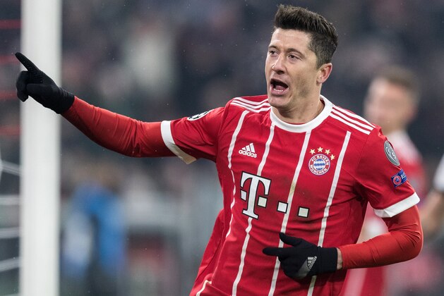 MUNICH, GERMANY - FEBRUARY 20:  Robert Lewandowski of FC Bayern Muenchen celebrates after scoring his team's fourth goal during the UEFA Champions League Round of 16 First Leg match between Bayern Muenchen and Besiktas at Allianz Arena on February 20, 2018 in Munich, Germany.  (Photo by Boris Streubel/Getty Images)