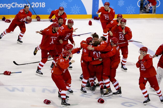 GANGNEUNG, SOUTH KOREA - FEBRUARY 25: Players of Olympic Athlete from Russia celebrate winning the gold medal following the Men's Ice Hockey Gold Medal match between Germany and Olympic Athlete from Russia on day sixteen of the PyeongChang 2018 Winter Olympic Games at Gangneung Hockey Centre on February 25, 2018 in Gangneung, South Korea. (Photo by Jean Catuffe/Getty Images)