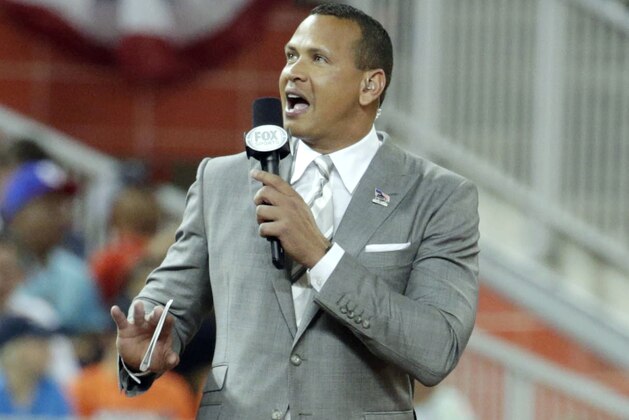 FILE - In this July 11, 2017, file photo, former MLB player Alex Rodriguez reports from the field during the MLB baseball All-Star Game in Miami. Rodriguez, ESPN’s new Sunday night analyst, doesn’t mind the lengthening time it takes to play a big league game.  (AP Photo/Lynne Sladky, File)