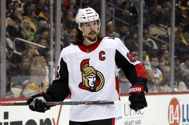 Ottawa Senators defenseman Erik Karlsson prepares for a face-off during an NHL hockey game against the Pittsburgh Penguins in Pittsburgh, Tuesday, Feb. 13, 2018. (AP Photo/Gene J. Puskar)