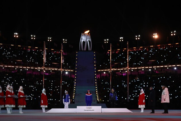 PYEONGCHANG-GUN, SOUTH KOREA - FEBRUARY 25:  (L-R) Silver medalist Krista Parmakoski of Finland, gold medalist Marit Bjorgen of Norway and bronze medalist Stina Nilsson of Sweden poses during the medal ceremony for the Cross-Country Skiing - Ladies' 30km Mass Start Classic during the Closing Ceremony of the PyeongChang 2018 Winter Olympic Games at PyeongChang Olympic Stadium on February 25, 2018 in Pyeongchang-gun, South Korea.  (Photo by Maddie Meyer/Getty Images)