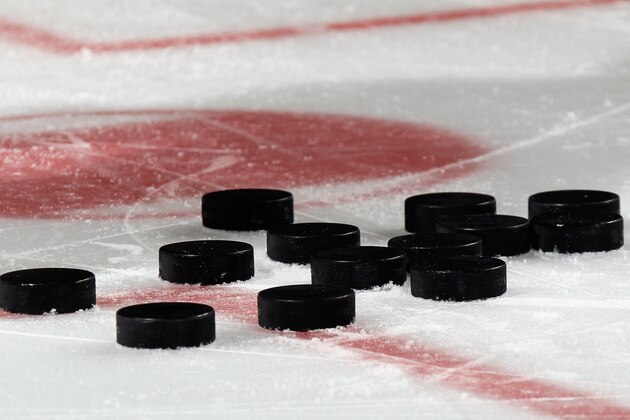NEWARK, NJ - MARCH 17: Pucks sit on the ice during warmups prior to the game betrween the New Jersey Devils and the Pittsburgh Penguins at the Prudential Center on March 17, 2015 in Newark, New Jersey.  (Photo by Bruce Bennett/Getty Images)