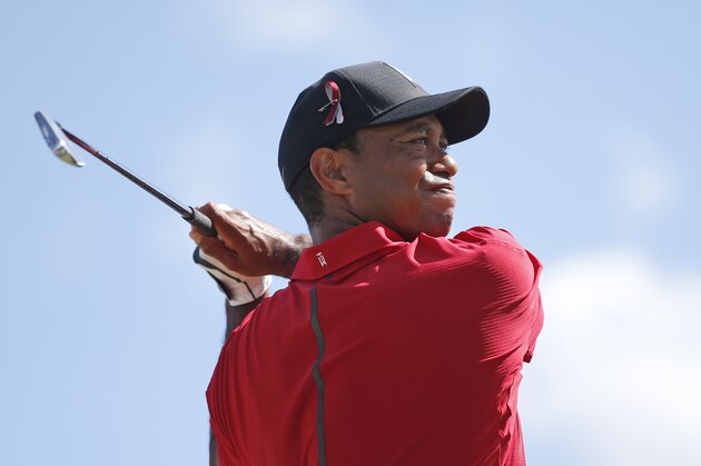 Tiger Woods tees off on the fourth hole during the final round of the Honda Classic golf tournament, Sunday, Feb. 25, 2018 in Palm Beach Gardens, Fla. (AP Photo/Wilfredo Lee)