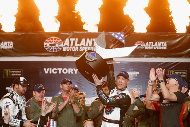 HAMPTON, GA - FEBRUARY 25:  Kevin Harvick, driver of the #4 Jimmy John's Ford, celebrates in Victory Lane after winning the Monster Energy NASCAR Cup Series Folds of Honor QuikTrip 500 at Atlanta Motor Speedway on February 25, 2018 in Hampton, Georgia.  (Photo by Brian Lawdermilk/Getty Images)