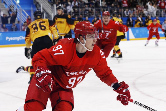 Russian athlete Nikita Gusev (97) reacts after scoring a goal during the third period of the men's gold medal hockey game against Germany at the 2018 Winter Olympics, Sunday, Feb. 25, 2018, in Gangneung, South Korea. (AP Photo/John Locher)