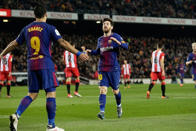 BARCELONA, SPAIN - FEBRUARY 24: Lionel Messi of FC Barcelona celebrates 2-1 with Luis Suarez of FC Barcelona  during the La Liga Santander  match between FC Barcelona v Girona at the Camp Nou on February 24, 2018 in Barcelona Spain (Photo by Eric Verhoeven/Soccrates/Getty Images)
