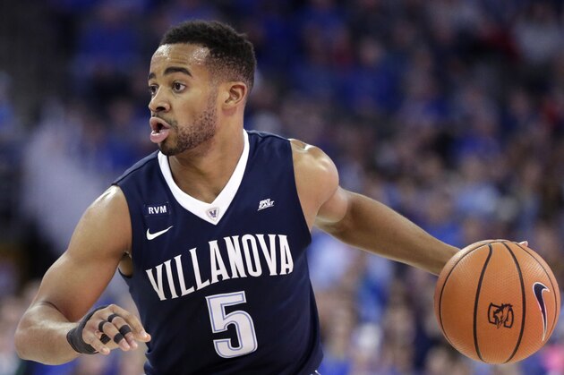 Villanova's Phil Booth (5) with the ball during the first half of an NCAA college basketball game against Creighton in Omaha, Neb., Saturday, Feb. 24, 2018. (AP Photo/Nati Harnik)
