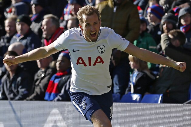 Tottenham Hotspur's English striker Harry Kane celebrates after scoring the opening goal during the English Premier League football match between Crystal Palace and Tottenham Hotspur at Selhurst Park in south London on February 25, 2018.
Tottenham won the game 1-0. / AFP PHOTO / Ian KINGTON / RESTRICTED TO EDITORIAL USE. No use with unauthorized audio, video, data, fixture lists, club/league logos or 'live' services. Online in-match use limited to 75 images, no video emulation. No use in betting, games or single club/league/player publications.  /         (Photo credit should read IAN KINGTON/AFP/Getty Images)