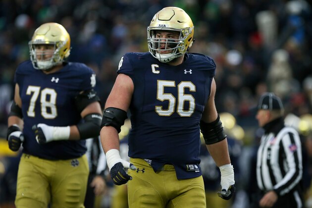 SOUTH BEND, IN - OCTOBER 28:  Quenton Nelson #56 of the Notre Dame Fighting Irish walks across the field in the second quarter against the North Carolina State Wolfpack at Notre Dame Stadium on October 28, 2017 in South Bend, Indiana. (Photo by Dylan Buell/Getty Images)