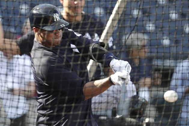Seattle Seahawks quarterback Russell Wilson hits during batting practice before a baseball spring exhibition game against the Philadelphia Phillies, Monday, Feb. 26, 2018, in Tampa, Fla. (AP Photo/Lynne Sladky)