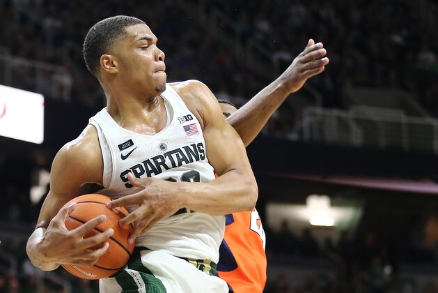 EAST LANSING, MI - FEBRUARY 20: Miles Bridges #22 of the Michigan State Spartans grabs a rebound during a game against the Illinois Fighting Illini at Breslin Center on February 20, 2018 in East Lansing, Michigan. (Photo by Rey Del Rio/Getty Images)