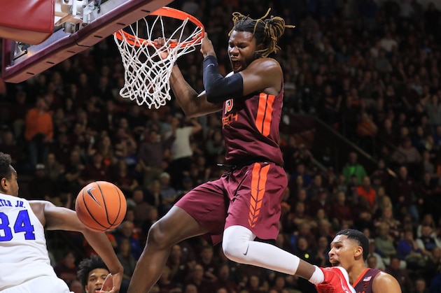 BLACKSBURG, VA - FEBRUARY 26: Chris Clarke #15 of the Virginia Tech Hokies celebrates after dunking against the Duke Blue Devils in the second half at Cassell Coliseum on February 26, 2018 in Blacksburg, Virginia. (Photo by Lauren Rakes/Getty Images)