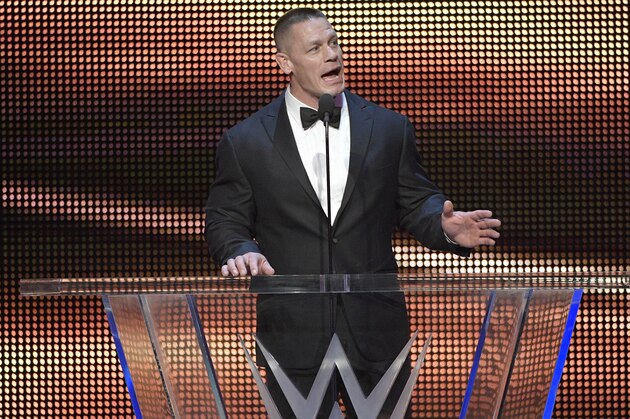 IMAGE DISTRIBUTED FOR WWE - John Cena inducts Kurt Angle into the WWE Hall of Fame as part of the WrestleMania 33 weekend during a ceremony on Friday, March 31, 2017, in Orlando, Fla. (Phelan M. Ebenhack/AP Images for WWE)