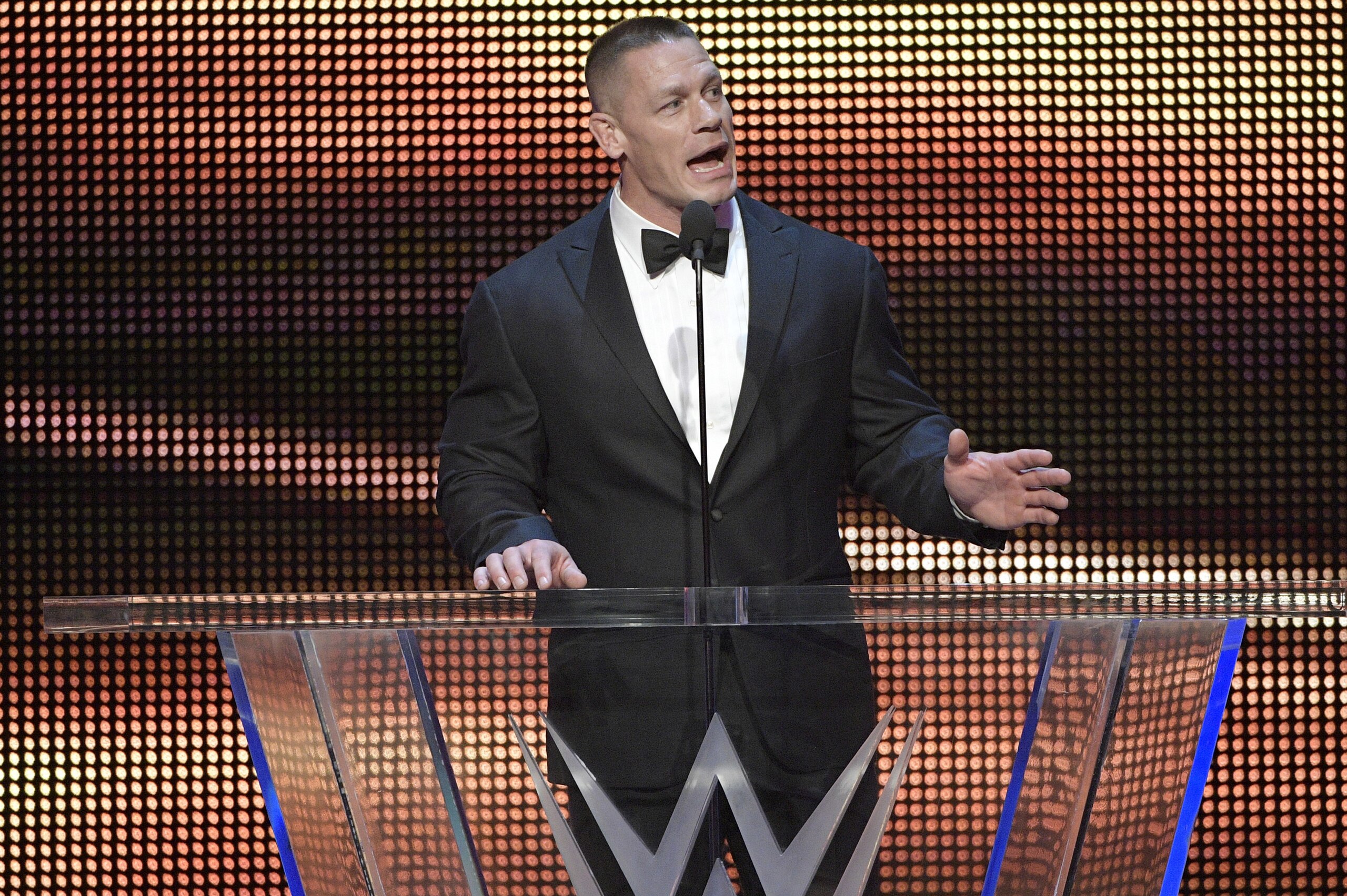 IMAGE DISTRIBUTED FOR WWE - John Cena inducts Kurt Angle into the WWE Hall of Fame as part of the WrestleMania 33 weekend during a ceremony on Friday, March 31, 2017, in Orlando, Fla. (Phelan M. Ebenhack/AP Images for WWE)