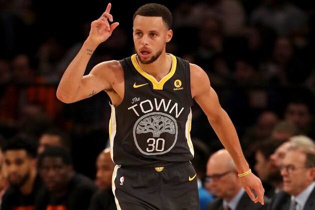 NEW YORK, NY - FEBRUARY 26:  Stephen Curry #30 of the Golden State Warriors celebrates his three point shot in the second half against the New York Knicks at Madison Square Garden on February 26, 2018 in New York City. NOTE TO USER: User expressly acknowledges and agrees that, by downloading and or using this Photograph, user is consenting to the terms and conditions of the Getty Images License Agreement  (Photo by Elsa/Getty Images)