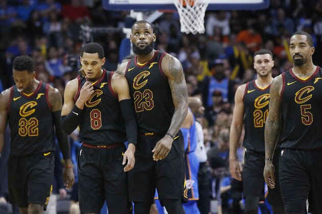 Cleveland Cavaliers forward Jeff Green (32), guard Jordan Clarkson (8), forward LeBron James (23), forward Larry Nance Jr. (24) and J.R. Smith (5) walk off the court during a time out in the second half of an NBA basketball game against the Oklahoma City Thunder in Oklahoma City, Tuesday, Feb. 13, 2018. (AP Photo/Sue Ogrocki)