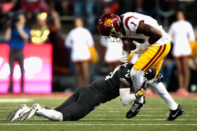 PULLMAN, WA - SEPTEMBER 29:  Joseph Lewis IV #1 of the USC Trojans is tackled by Marcellus Pippins #21 of the Washington State Cougars in the second half at Martin Stadium on September 29, 2017 in Pullman, Washington.  Washington State defeated USC 30-27.  (Photo by William Mancebo/Getty Images)