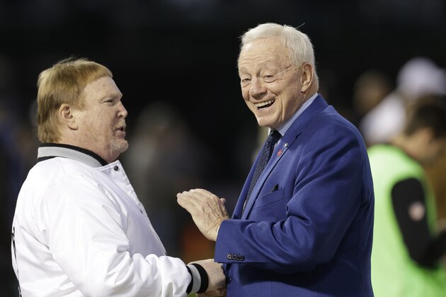 Oakland Raiders owner Mark Davis, left, talks with Dallas Cowboys owner Jerry Jones before an NFL football game between the Raiders and the Cowboys in Oakland, Calif., Sunday, Dec. 17, 2017. (AP Photo/Ben Margot)
