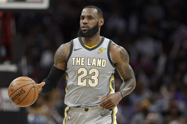 Cleveland Cavaliers' LeBron James drives against the San Antonio Spurs in the second half of an NBA basketball game, Sunday, Feb. 25, 2018, in Cleveland. (AP Photo/Tony Dejak)