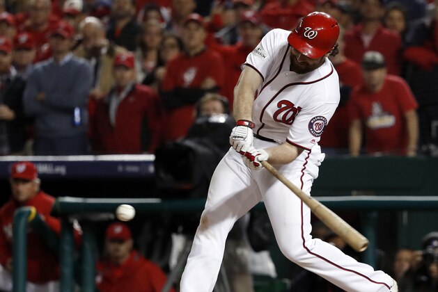 Washington Nationals' Daniel Murphy (20) hits a double during the sixth inning in Game 5 of baseball's National League Division Series against the Chicago Cubs, at Nationals Park, Thursday, Oct. 12, 2017 in Washington. (AP Photo/Pablo Martinez Monsivais)