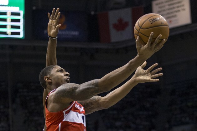 Washington Wizards' Bradley Beal goes in for a layup against the Milwaukee Bucks  during the first half of an NBA basketball game Tuesday, Feb. 27, 2018, in Milwaukee. (AP Photo/Tom Lynn)