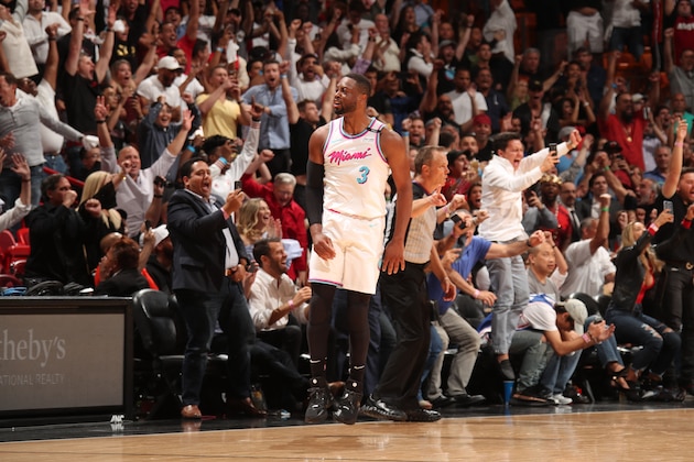 MIAMI, FL - FEBRUARY 27:   Dwyane Wade #3 of the Miami Heat reacts after making the game-winning shot against the Philadelphia 76ers on February 27, 2018 at American Airlines Arena in Miami, Florida. NOTE TO USER: User expressly acknowledges and agrees that, by downloading and or using this Photograph, user is consenting to the terms and conditions of the Getty Images License Agreement. Mandatory Copyright Notice: Copyright 2018 NBAE (Photo by Issac Baldizon/NBAE via Getty Images)
