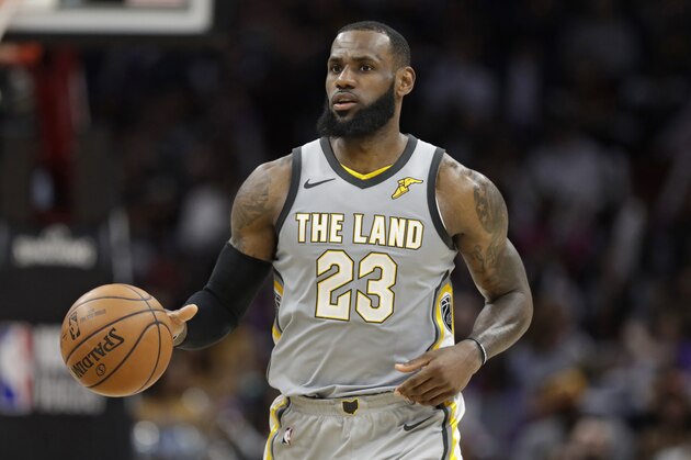 Cleveland Cavaliers' LeBron James drives against the San Antonio Spurs in the second half of an NBA basketball game, Sunday, Feb. 25, 2018, in Cleveland. (AP Photo/Tony Dejak)