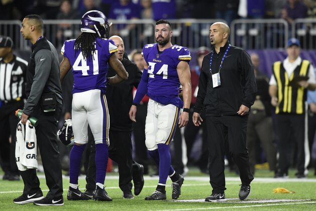 MINNEAPOLIS, MN - JANUARY 14: Andrew Sendejo #34 of the Minnesota Vikings walks off the field with trainers after suffering an injury in the third quarter of the NFC Divisional Playoff game against the New Orleans Saints on January 14, 2018 at U.S. Bank Stadium in Minneapolis, Minnesota. Sendejo was later ruled out for the game with a concussion.  (Photo by Hannah Foslien/Getty Images)