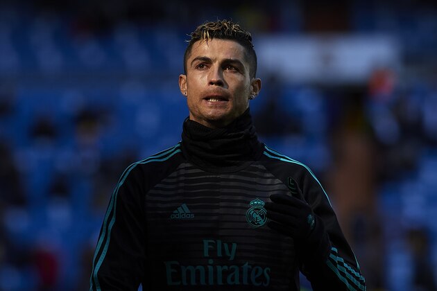 MADRID, SPAIN - FEBRUARY 24:  Cristiano Ronaldo of Real Madrid warms up prior to the La Liga match between Real Madrid and Deportivo Alaves at Estadio Santiago Bernabeu on February 24, 2018 in Madrid, Spain.  (Photo by Quality Sport Images/Getty Images)