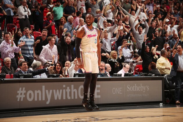 MIAMI, FL - FEBRUARY 27:   Dwyane Wade #3 of the Miami Heat reacts after making the game-winning shot against the Philadelphia 76ers on February 27, 2018 at American Airlines Arena in Miami, Florida. NOTE TO USER: User expressly acknowledges and agrees that, by downloading and or using this Photograph, user is consenting to the terms and conditions of the Getty Images License Agreement. Mandatory Copyright Notice: Copyright 2018 NBAE (Photo by Issac Baldizon/NBAE via Getty Images)