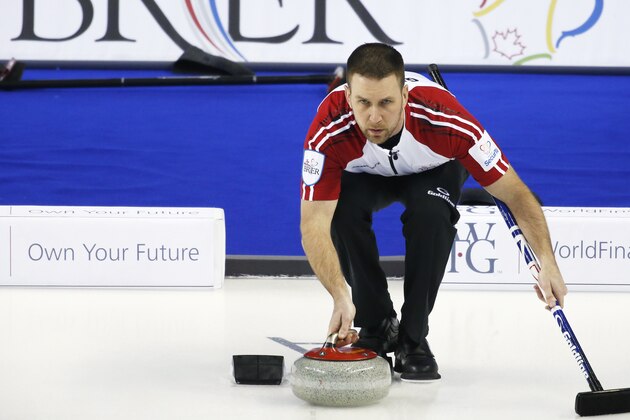 CALGARY, AB - MARCH 1: Newfoundland and Labrador skip Brad Gushue delivers his shot in his game against Northwest Territories during the Tim Horton's Brier at the Scotiabank Saddledome on March 1, 2015 in Calgary, Alberta, Canada. (Photo by Todd Korol/Getty Images)