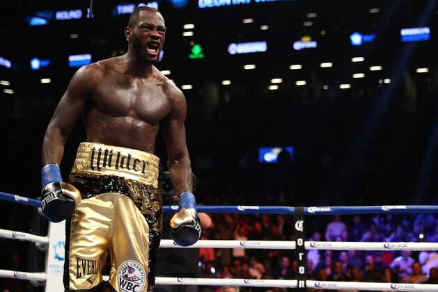 NEW YORK, NY - NOVEMBER 04: Deontay Wilder celebrates after knocking down Bermane Stiverne in the first round during their rematch for Wilder's WBC heavyweight title at the Barclays Center on November 4, 2017 in the Brooklyn Borough of New York City. (Photo by Al Bello/Getty Images) NEW YORK, NY - NOVEMBER 04: Deontay Wilder celebrates after knocking down Bermane Stiverne in the first round during their rematch for Wilder's WBC heavyweight title at the Barclays Center on November 4, 2017 in the Brooklyn Borough of New York City. (Photo by Al Bello/Getty Images)
